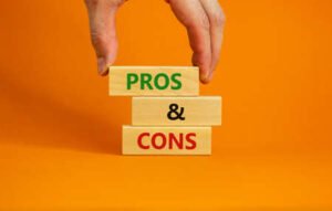 167247506-pros-and-cons-symbol-wooden-blocks-with-words-pros-and-cons-beautiful-orange-background.jpg