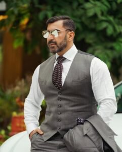 Photo-of-Nawab-Shah-on-October-04-2024.-May-be-an-image-of-one-or-more-people-beard-wrist-watch-suit-waistcoat-dinner-jacket-and-blazer.jpg